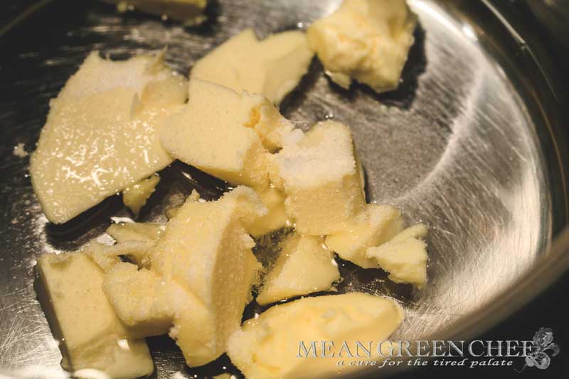 Water, butter, sugar and salt being brought to a boil for Pate a Choux Pastry.