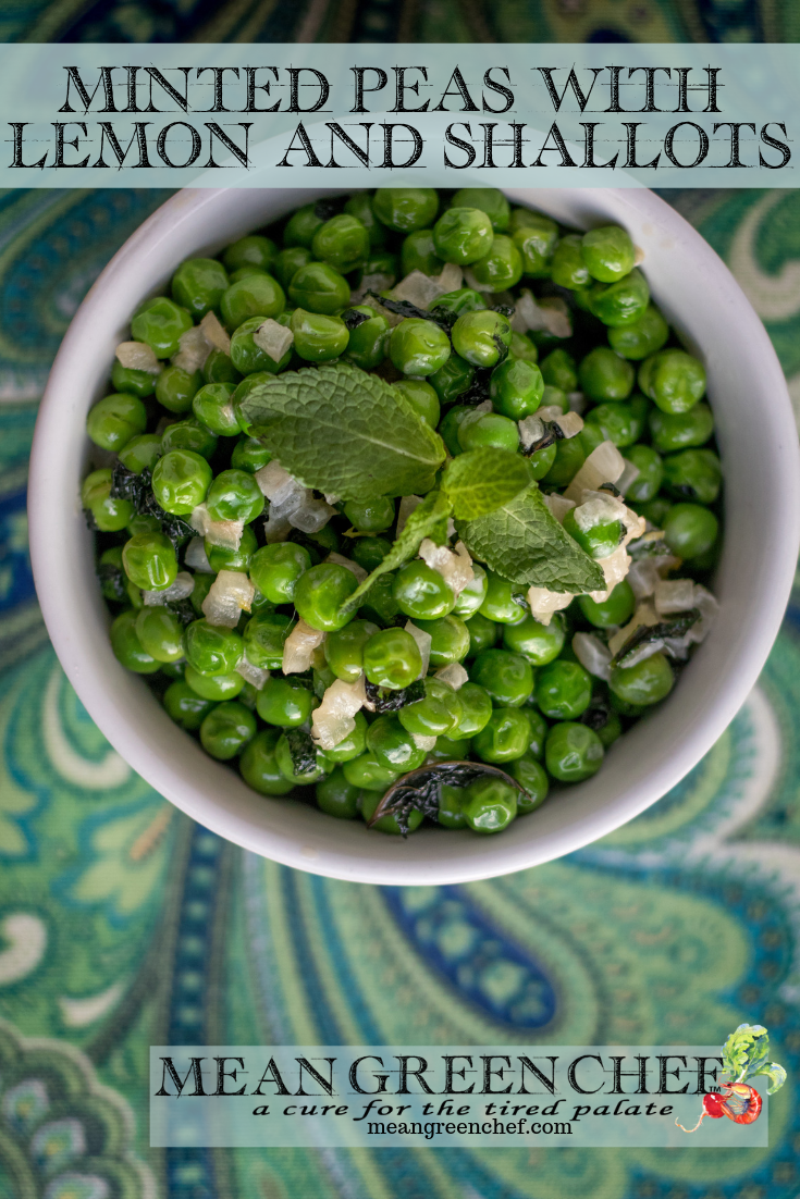 Minted Peas with Lemon and Shallots in a white bowl on a paisley background.