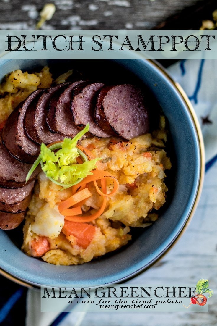 Overhead photo of a bowl of Dutch Stamppot with smoked sausage garnished with carrots and celery sprouts. Mean Green Chef