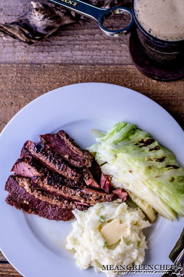 Plate of Traditional Irish Colcannon, Guinness Braised Corned Beef + Cabbage with stout.