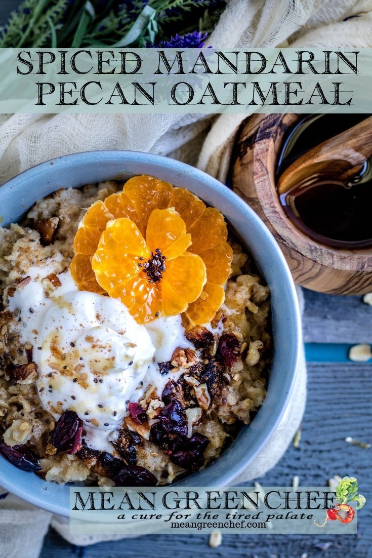 Overhead shot of a bowl of Spiced Mandarin Pecan Oatmeal garnished with whipped cream and Sumo Citrus.
