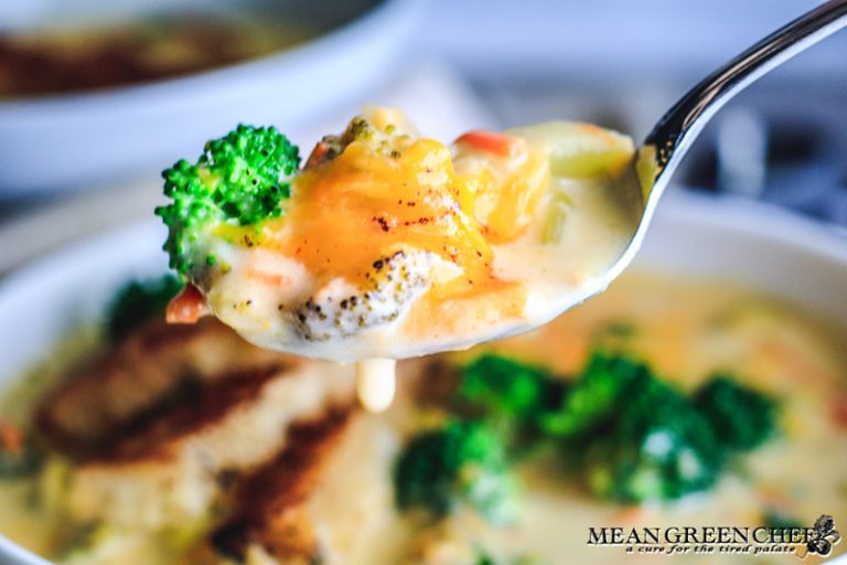A dripping spoonful of Bistro Broccoli Cheese Soup.