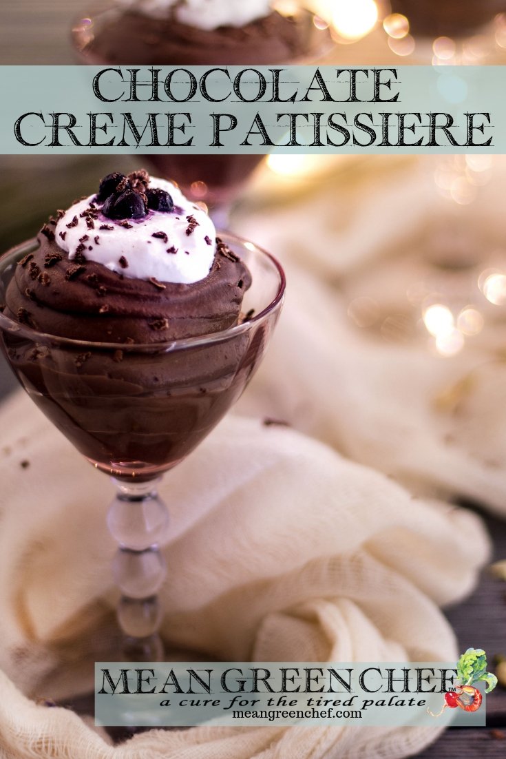 Rich Chocolate Creme Patissiere Pastry Cream piped into dessert glasses topped with whipped cream and blueberries.