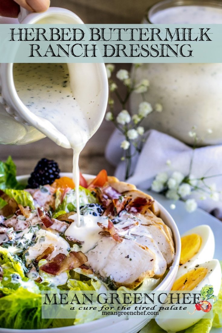 Herbed Buttermilk Ranch Dressing being poured over a chicken bacon ranch salad