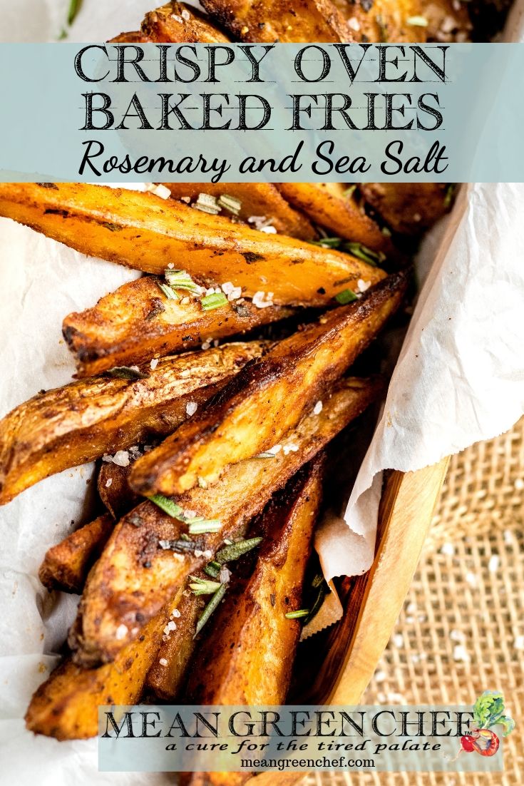 Crispy Oven Baked Fries in a wooden vessel with parchment paper.